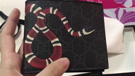 how to tell if gucci wallet is real|authentic gucci snake wallet.